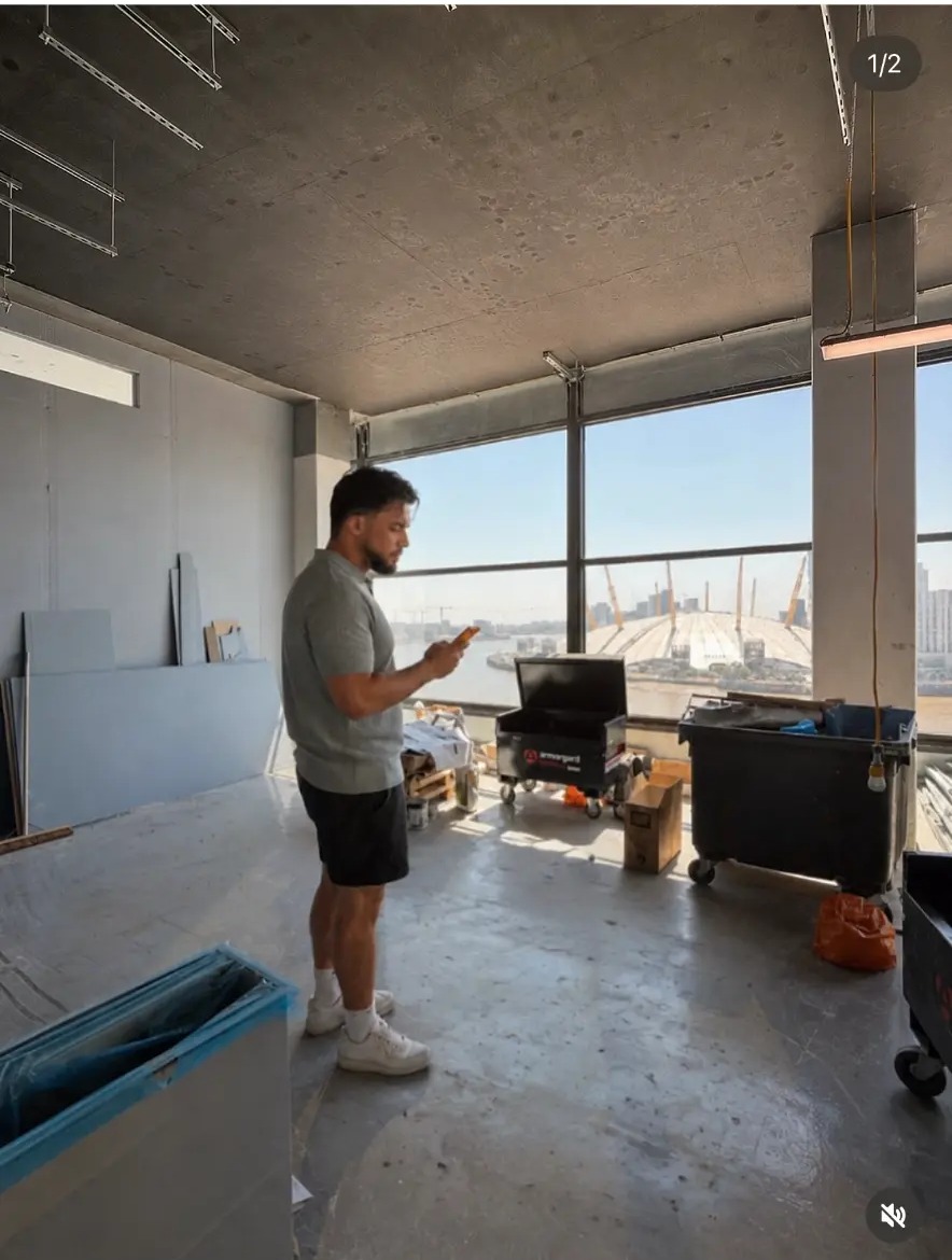 Mitch Mottram on a site visit at a media facility development overlooking the Thames, Greenwich and the O2 arena in London