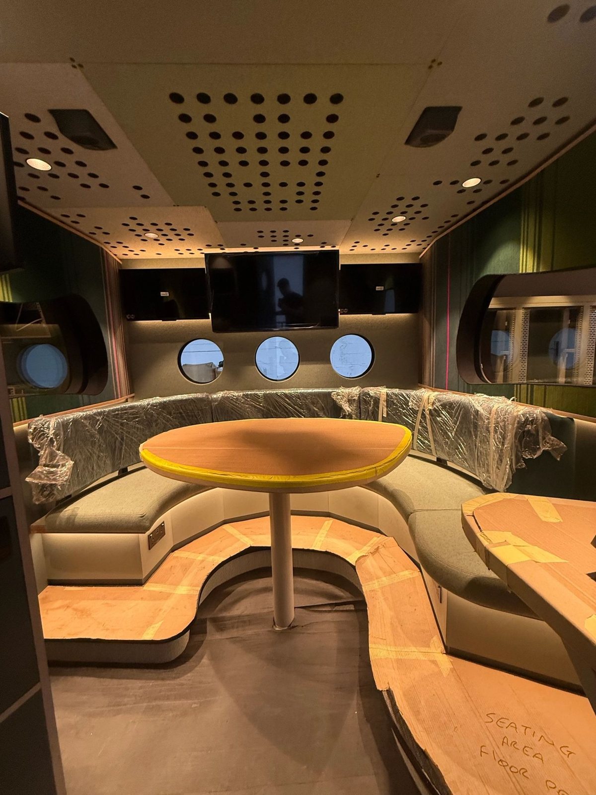 OB vehicle interior Finished outside broadcast vehicle interior with production seating and monitor wall built by Mottram Broadcast