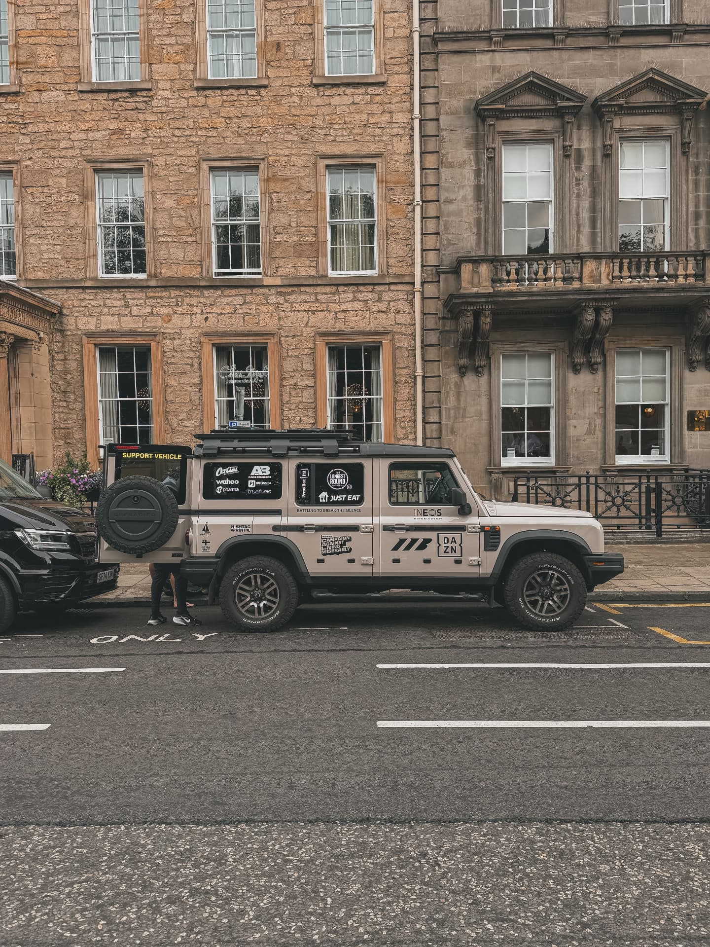 Support vehicle, Edinburgh Mitch Mottram's Longest Round INEOS Grenadier support vehicle parked on a Georgian sandstone street in Edinburgh before the ride south to Morocco